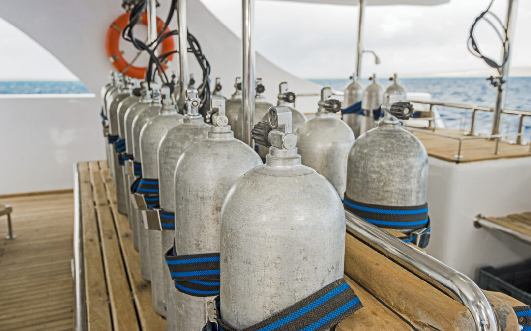 Scuba diving cylinders on a dive boat in tahiti